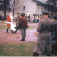 Santa giving out presents to the brats