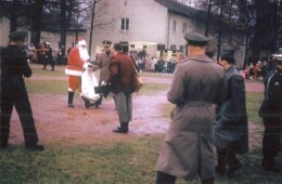 Santa giving out presents to the brats