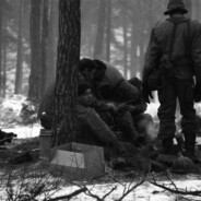 Exhausted troops up near the Iron Curtain